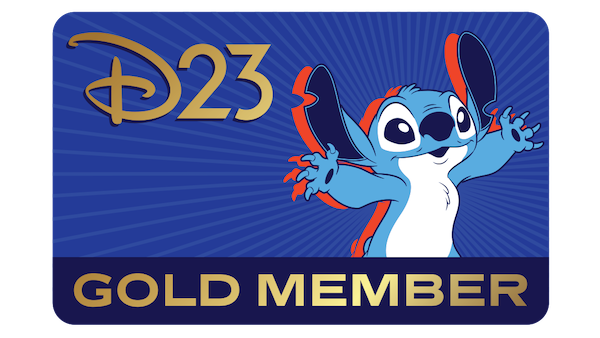 The D23 Gold Member card is pictured, featuring Stitch on the right, set against a dark blue background. To the left and slightly above Stitch is the D23 logo, in gold, and below Stitch (against a darker blue border) are the words “Gold Member” in gold lettering.